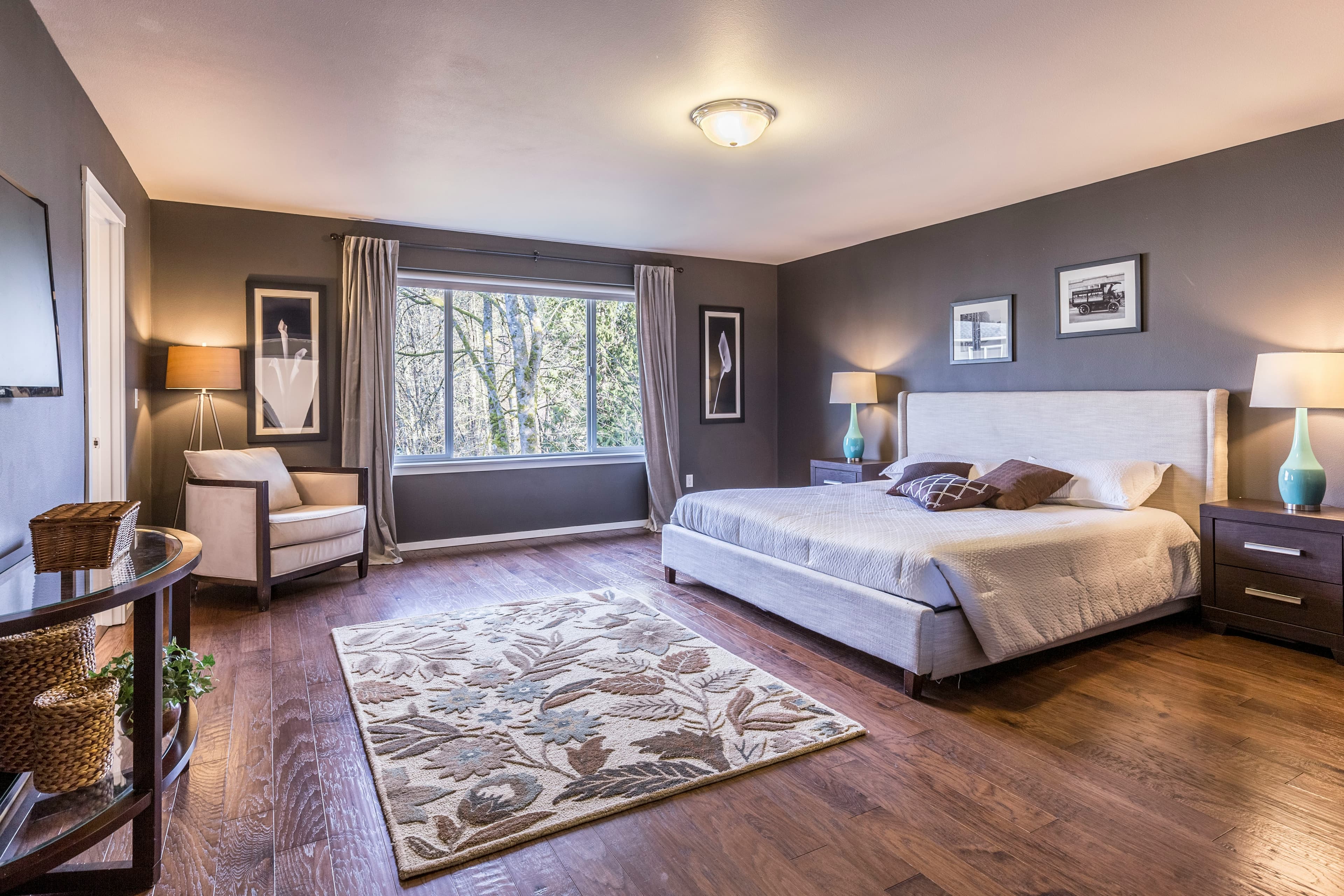 Freshly painted room with protected floors and painting supplies